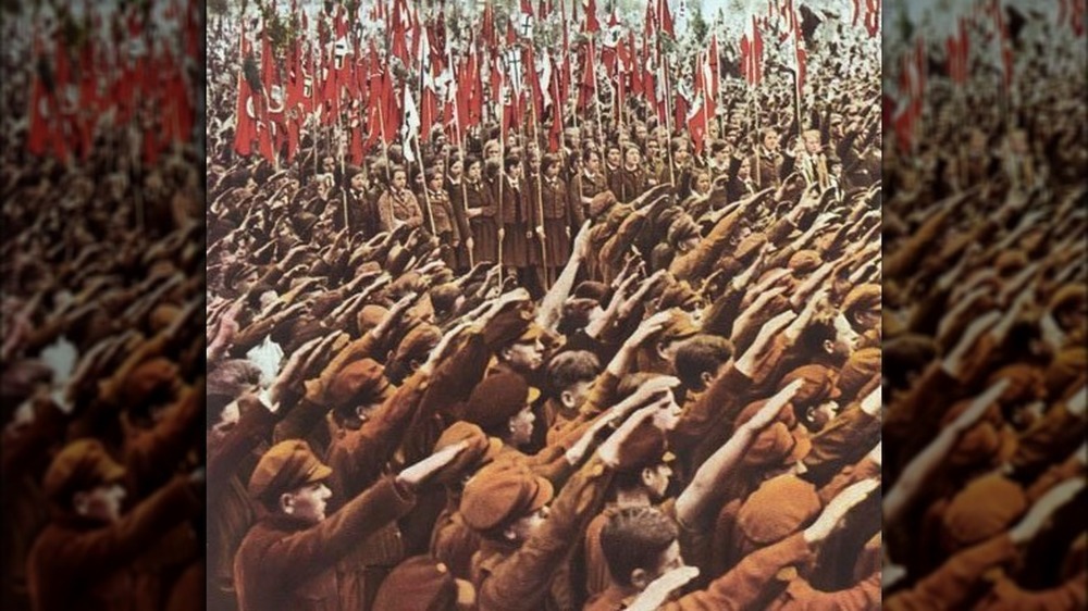 Hitler Youth at a Berlin rally in 1933 with arms raised