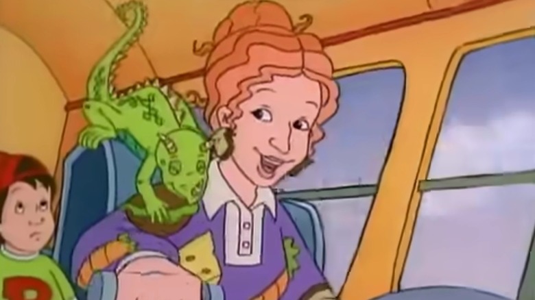 Miss Frizzle and Liz driving the Magic School Bus