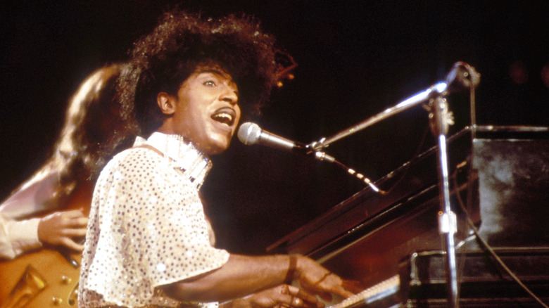 Little Richard singing and playing piano