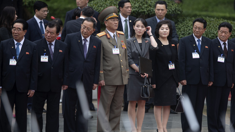 Kim Yo-jong stands with North Korean officials in Hanoi, Vietnam