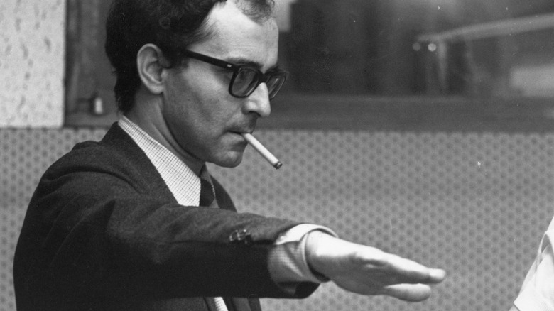Jean-Luc Godard with cigarette