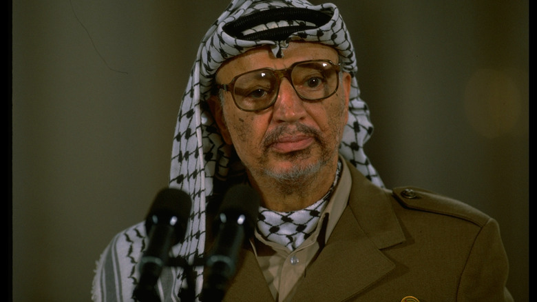 Palestine's Yasser Arafat at a podium