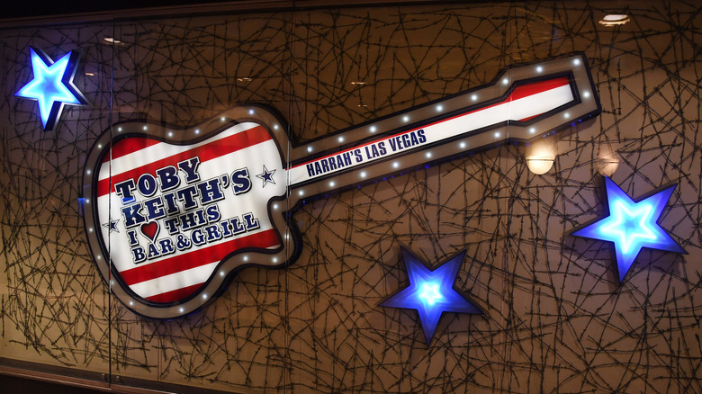 The sign for the first Toby Keith restaurant lights up in Vegas
