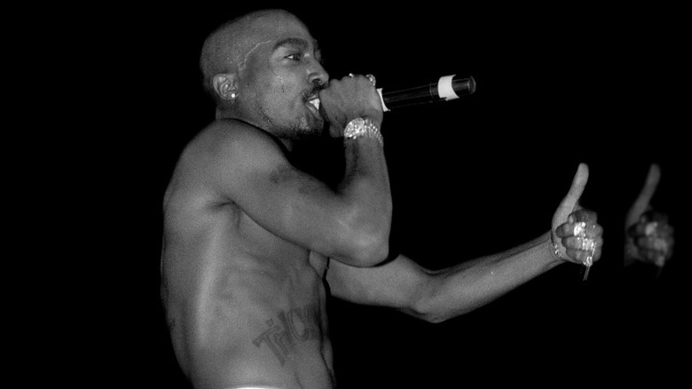 Tupac Shakur performing onstage
