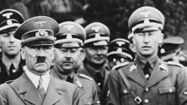 Hitler, Eichmann, Heydrich, standing together