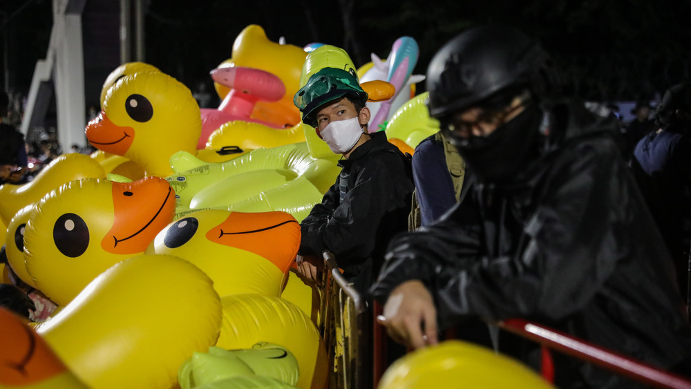 Protesters in Bangkok in 2020 using inflatable rubber ducks against the police