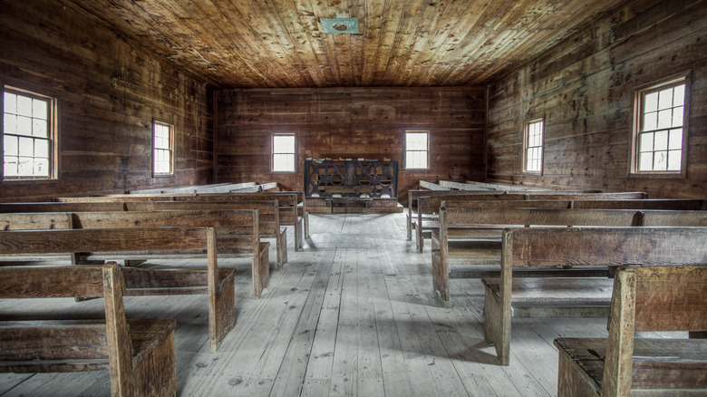 primitive church with wooden pews