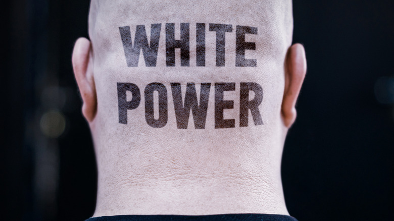 Man with White Power tattoo on head