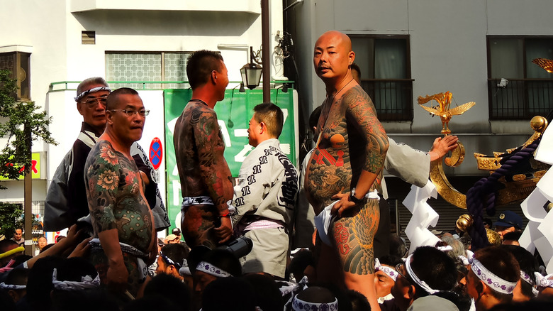Yakuza members showing off body tattoos