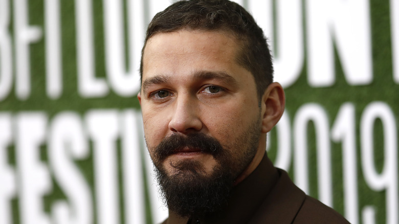 shia laBeouf staring intensely with beard