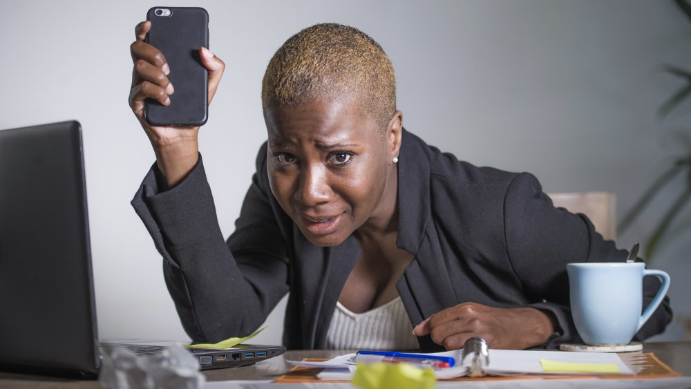 woman upset phone social media