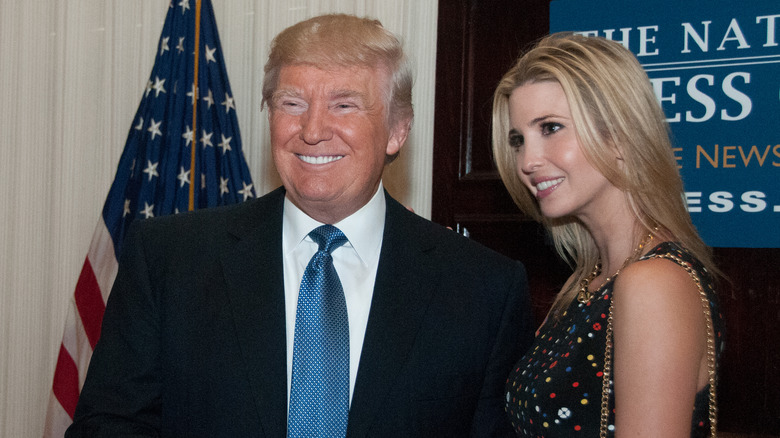Donald and Ivanka Trump posing and smiling