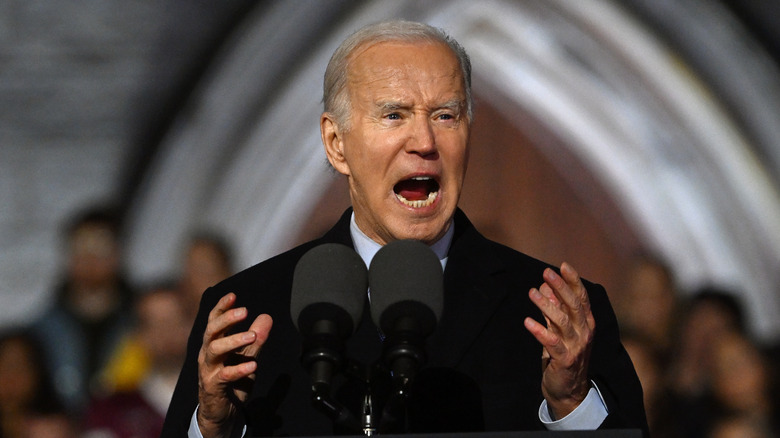 Joe Biden shouting while gesturing with both hands