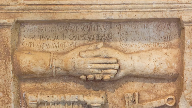 Ancient Greek handshake relief