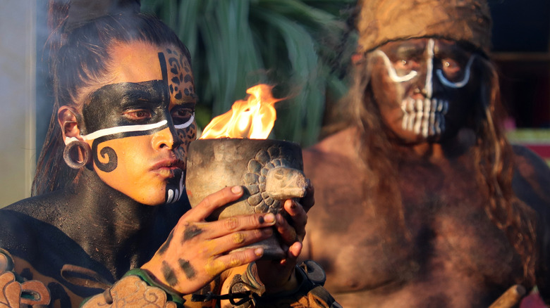 people performing Mayan ritual