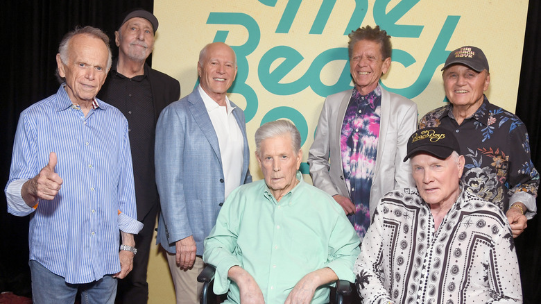 The Beach Boys posing together elderly