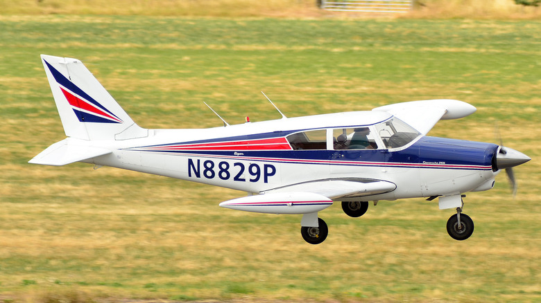 Piper PA-24 Comanche flying 