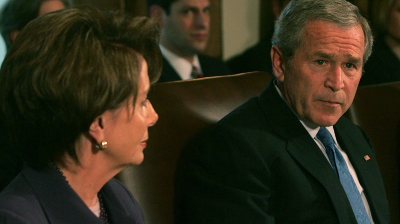 Nancy Pelosi stares down George W. Bush