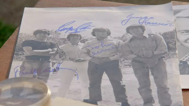 beatles picture with fake signatures