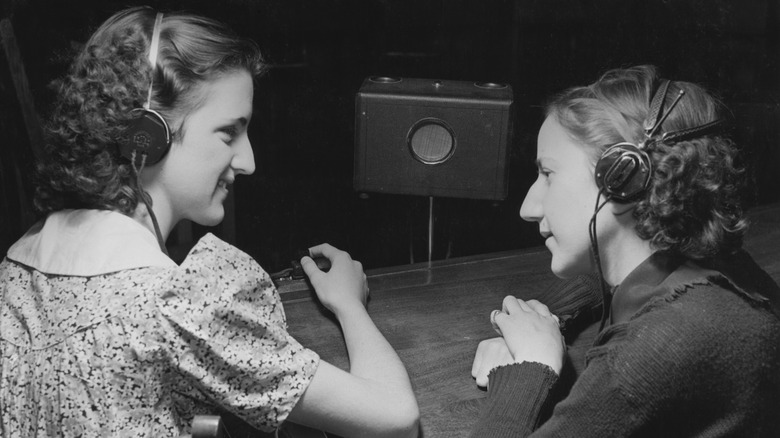 Two girls at school for deaf, 1950s