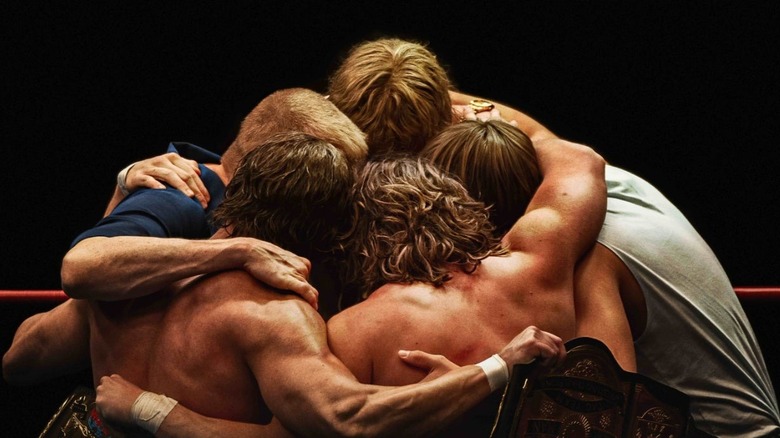 The Von Erichs shirtless hug in ring