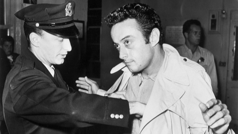 Lenny Bruce being frisked by police officer