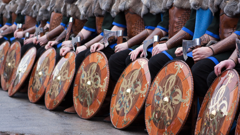 Vikings holding shields