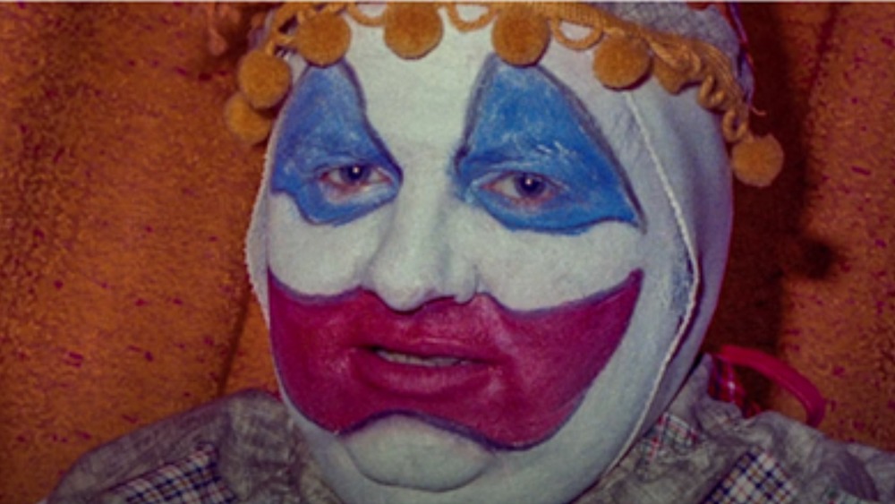 John Wayne Gacy in clown outfit