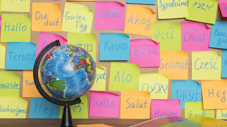 Globe with language sticky notes