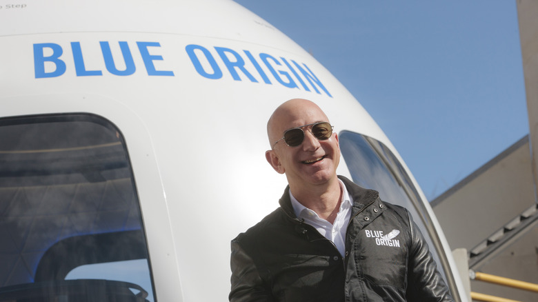 Jeff Bezos smugly laughing about how we all paid for his toy to go to space