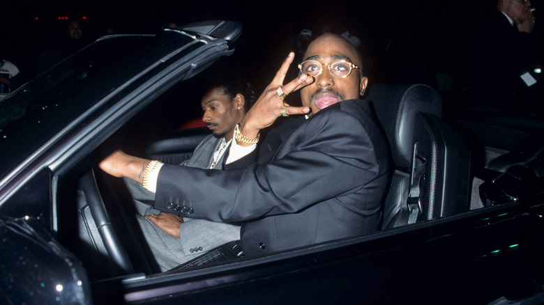 Tupac and Snoop Dogg driving