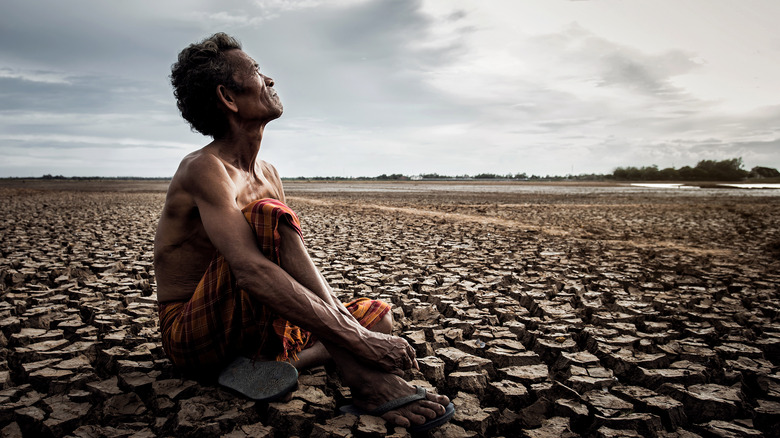 Person on drought-stricken field