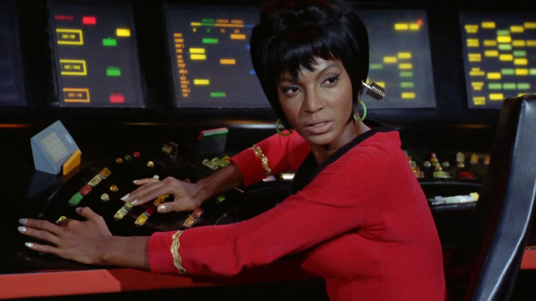 Uhura at her terminal on the bridge