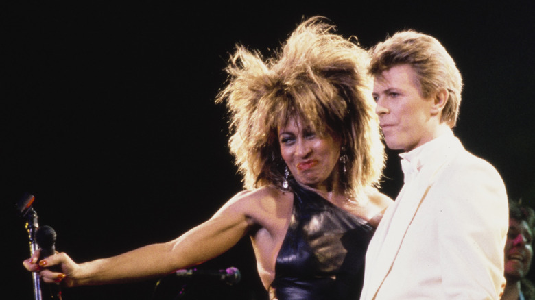 Tina Turner performing on stage with David Bowie