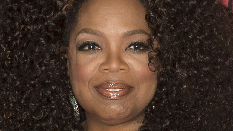 oprah winfrey attending a premiere