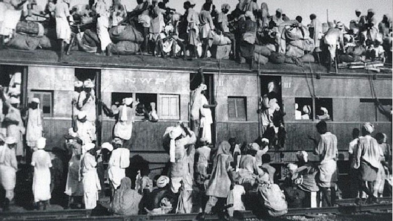 Hindus and Sikh board train to India