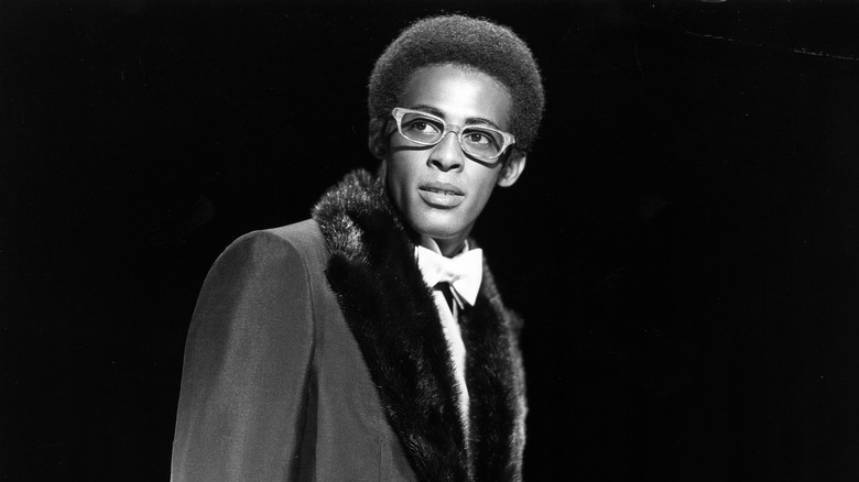 David Ruffin fur-lined suit glasses looking sideways
