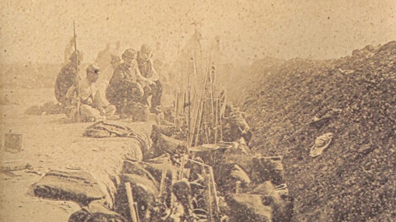 Uruguayan troops trenches rifles sepia
