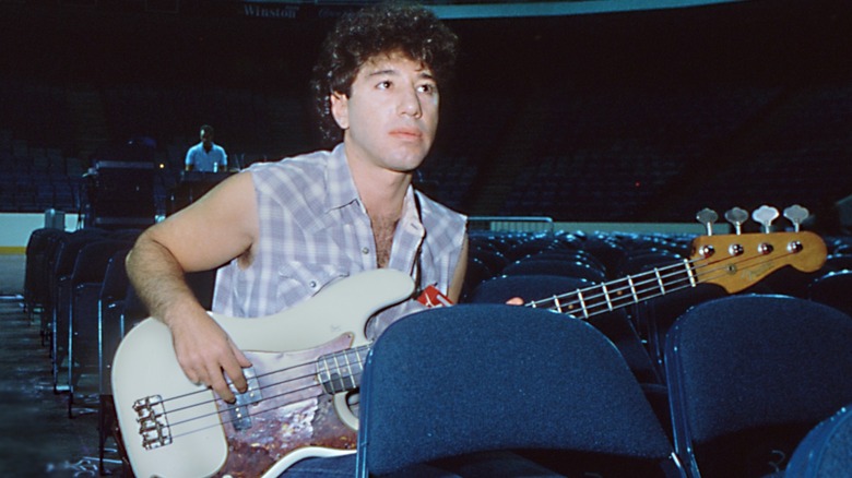 Young Howie Epstein sat playing bass