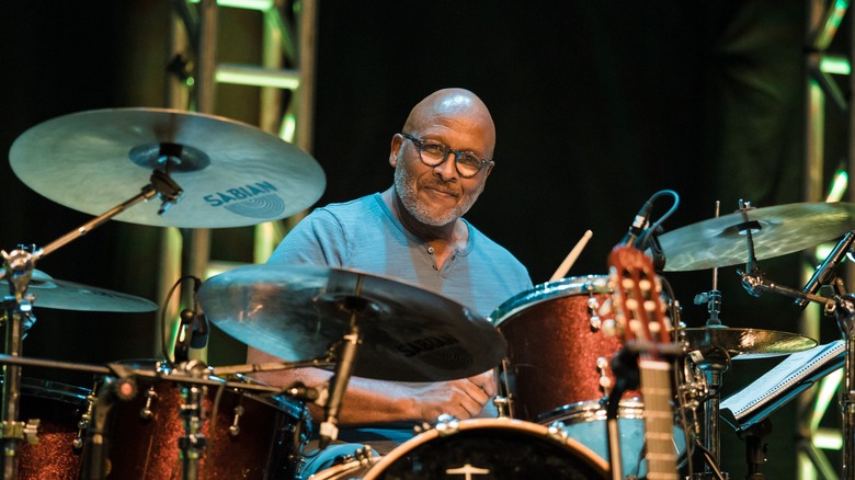 Steve Ferrone glasses playing drums