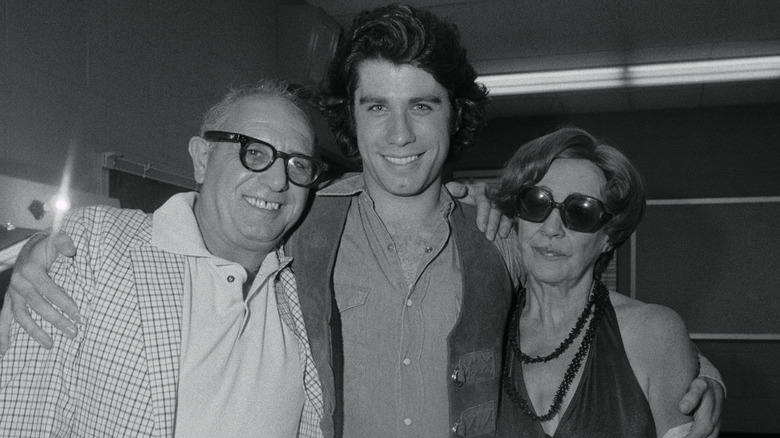 John Travolta posing with his parents