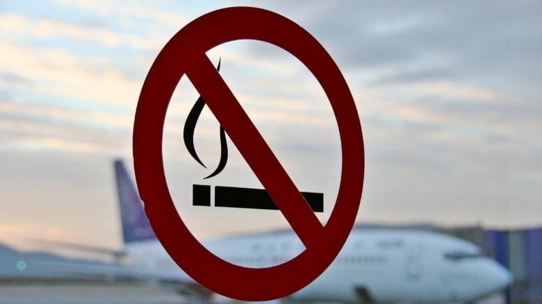 No smoking sign airplane