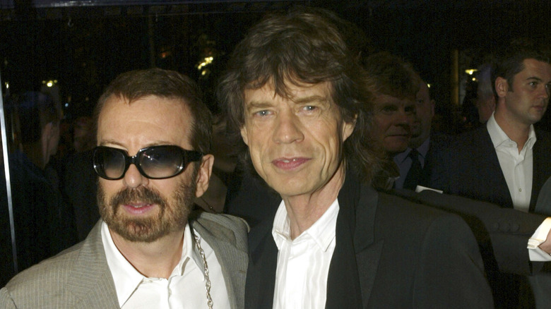 Dave Stewart and Mick Jagger at a premiere