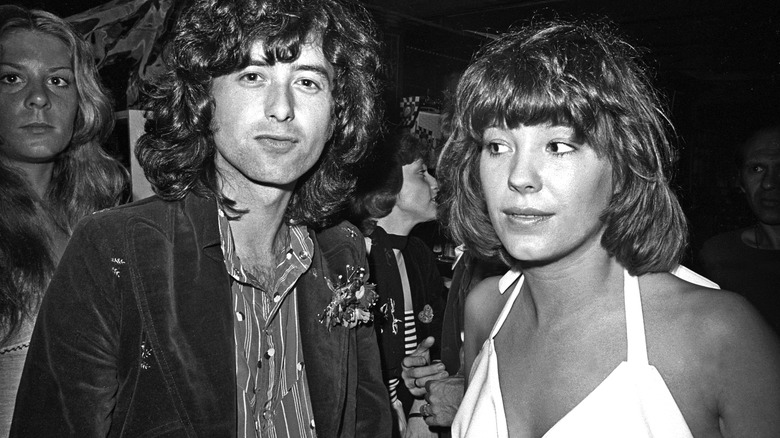 Pamela Des Barres and Jimmy Page at a party