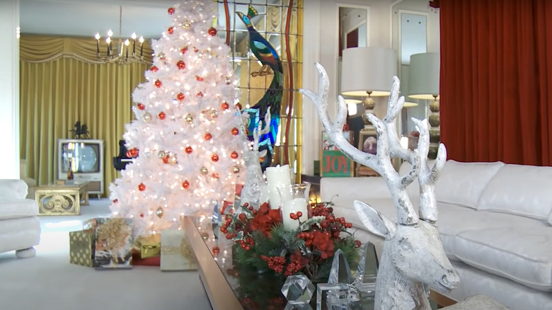 Presents surround Graceland Christmas tree
