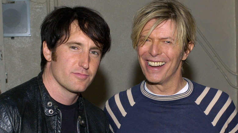 Trent Reznor and David Bowie smiling