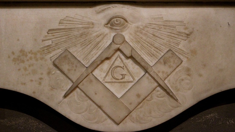Freemasonry symbol carved into stone