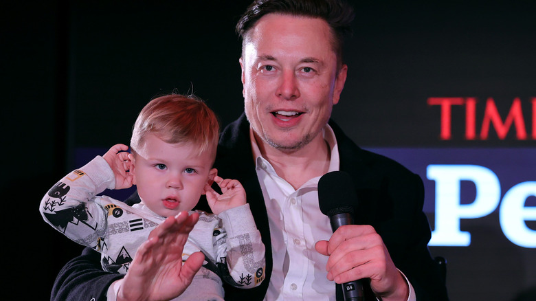 Elon Musk with baby X
