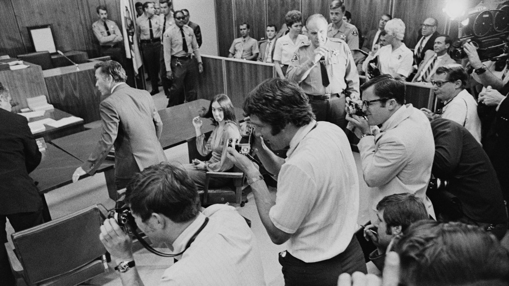 Reporters at a press conference about the Manson Family