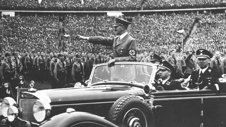 Hitler saluting at rally